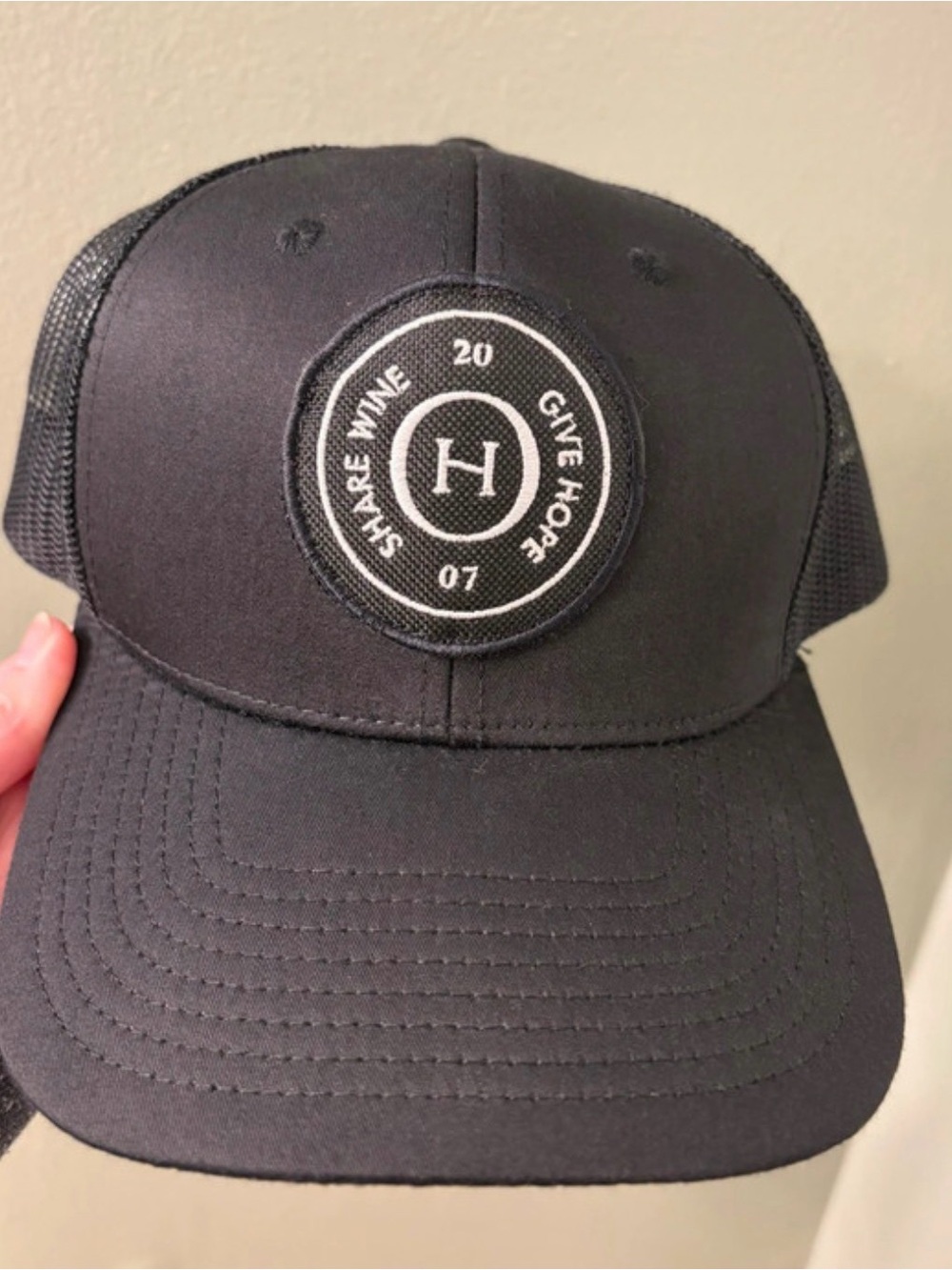 Share Wine Give Hope Black Trucker Cap